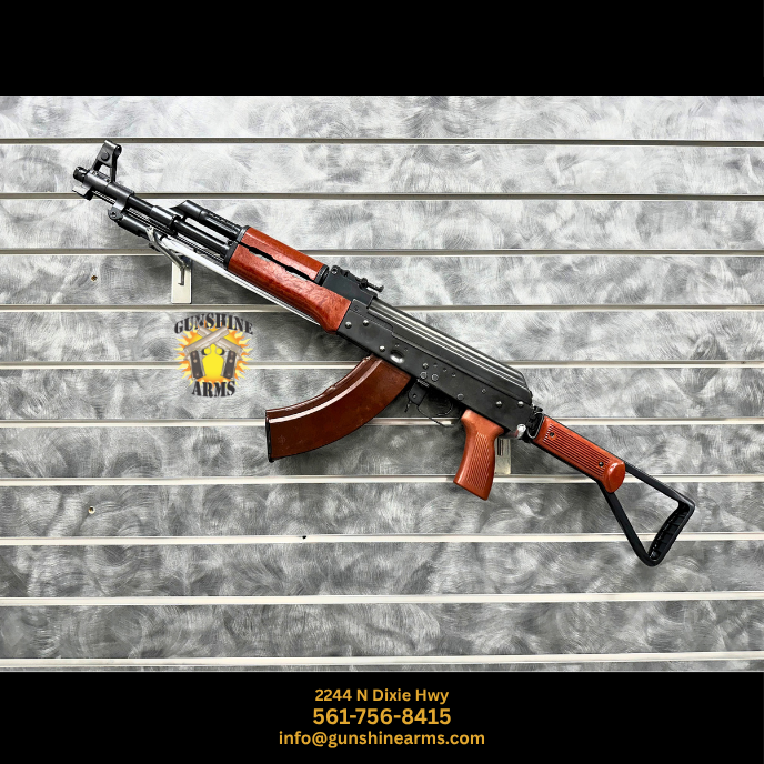 Hard Times Armory AKS Spiker 7.62x39 machine gun, left side with the folding spike bayonet under the barrel