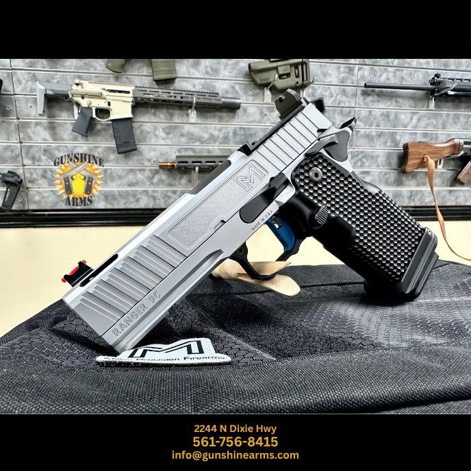 Compact 2011 pistol — pre-owned Miller Precision Firearms Ranger 9C in Silver PVD with V-ported slide, Enhanced Dot aluminum grip, blue trigger, and optic plate, resting on a Miller Precision soft case at Gunshine Arms