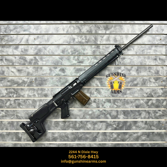 SIG 550 sniper rifle – Swiss SIG SG 550-1 Sniper, full right-side view on the Gunshine Arms wall with folding precision stock, translucent magazine, and 25.6-inch heavy barrel