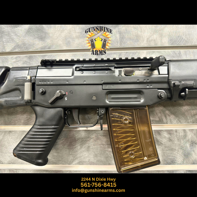 SIG 550 sniper rifle – right-side receiver of the SG 550-1 Sniper with top rail, charging handle, two-stage trigger, and translucent magazine